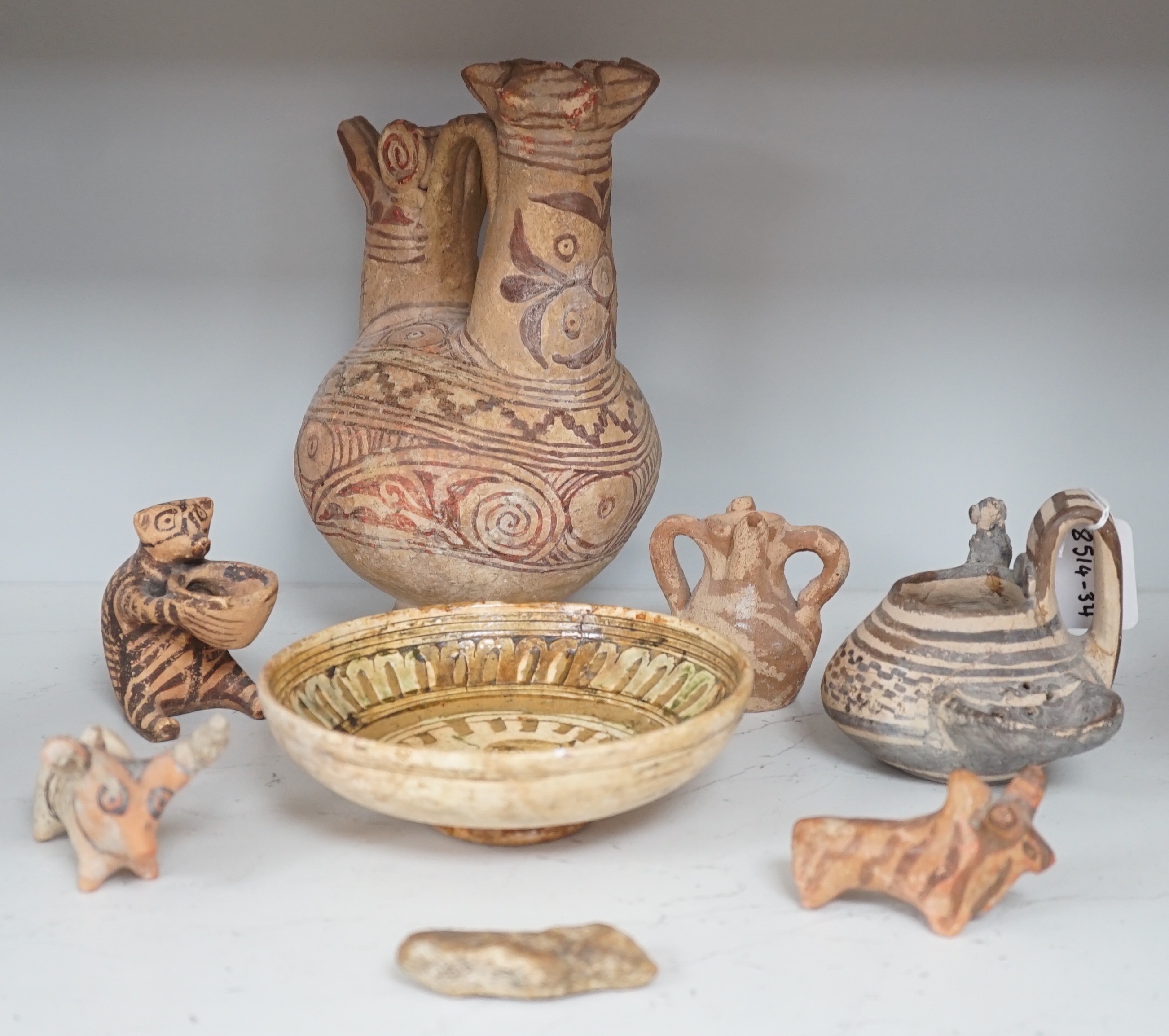 A selection of early Pre-Colombian, and other ceramics, to include an unusual vessel. Tallest 26cm